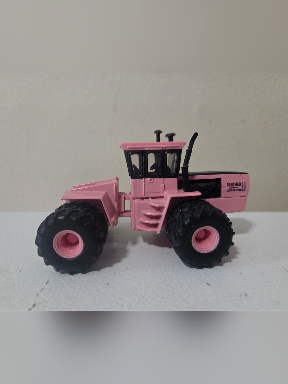 ERTL 1/64 Pink Steiger Panther II ST-310 with Front & Rear Dual Wheels 44331